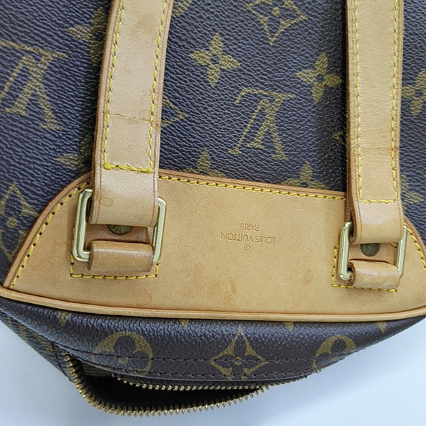 EXCURSION Monogram Coated Canvas Brown