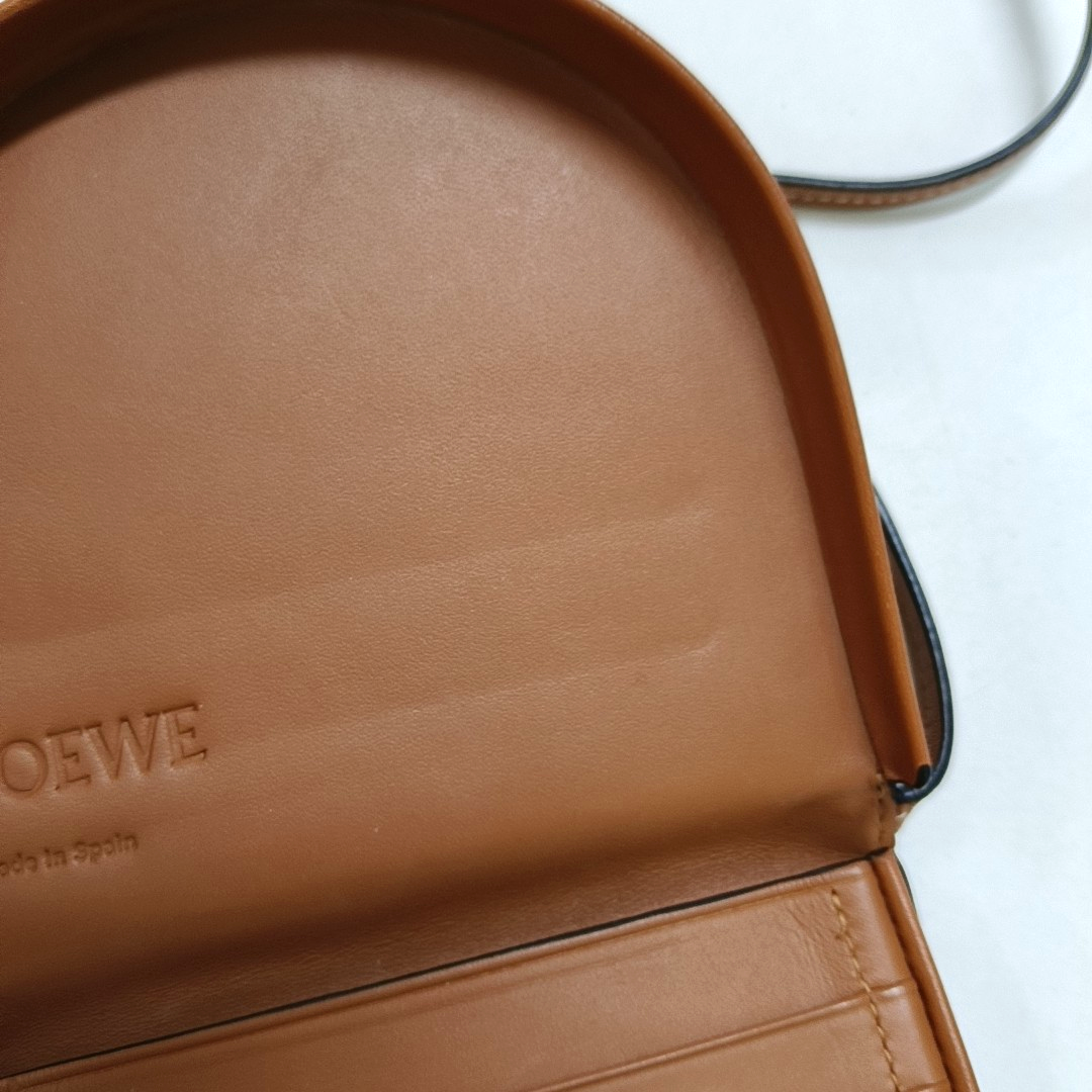 Authenticated pre-owned  Heel Small Calfskin Brown - Crossbody Bag at Looply