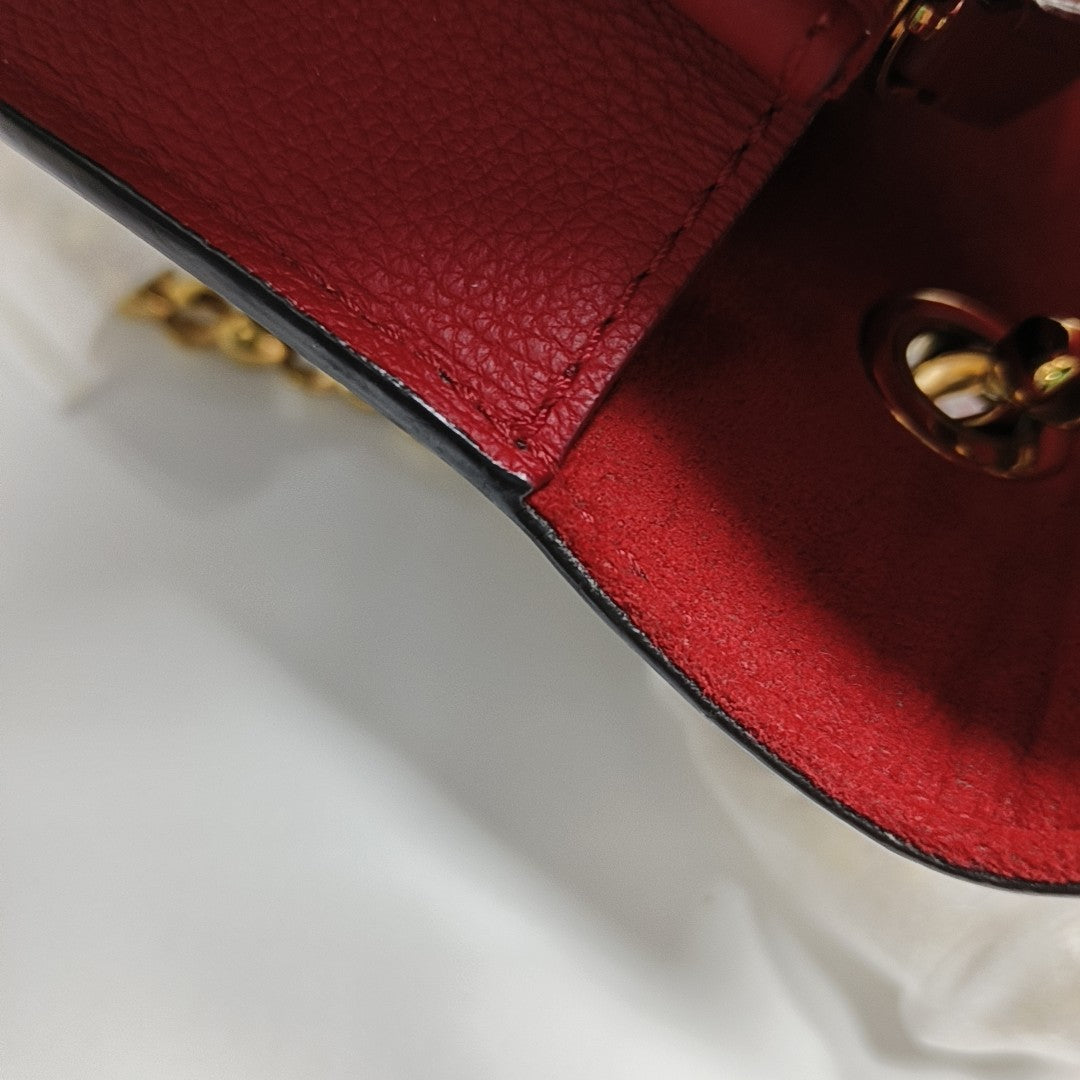 VICTOIRE Monogram Coated Canvas Brown