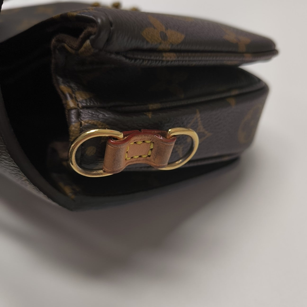 MÉTIS EAST WEST Monogram Coated Canvas Brown