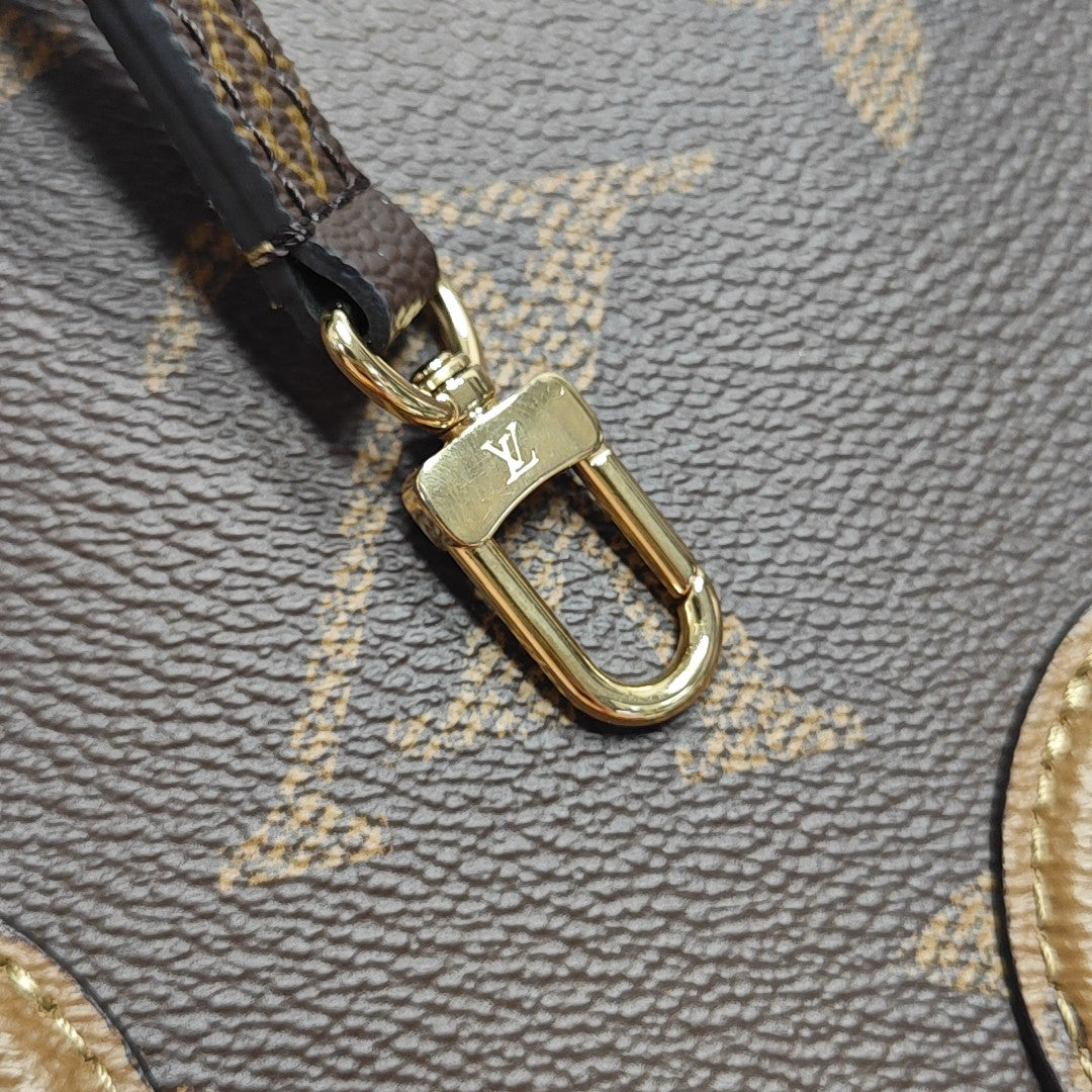 ONTHEGO BB Monogram Coated Canvas Brown