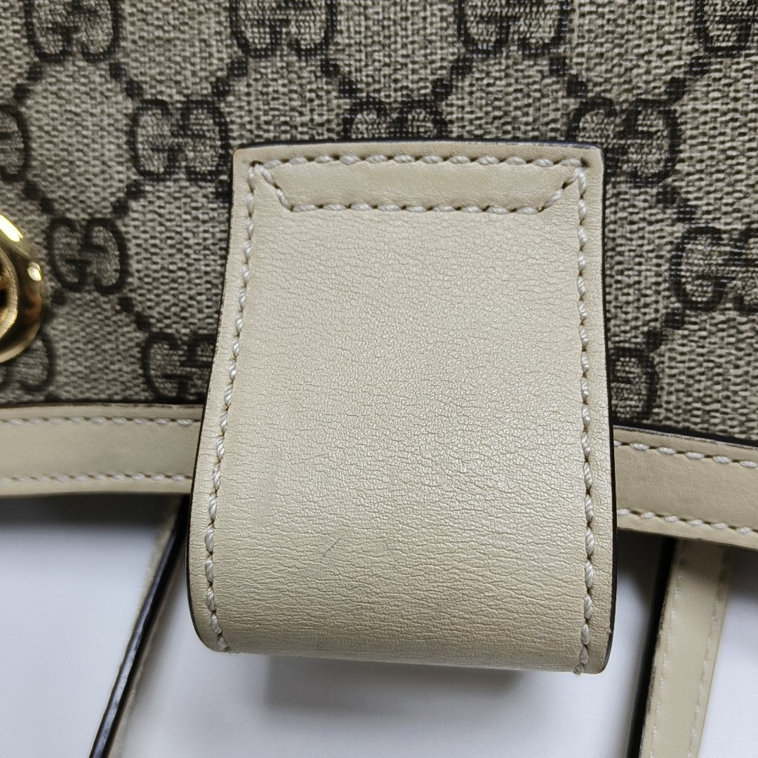 Padlock Small Monogram Coated Canvas Beige