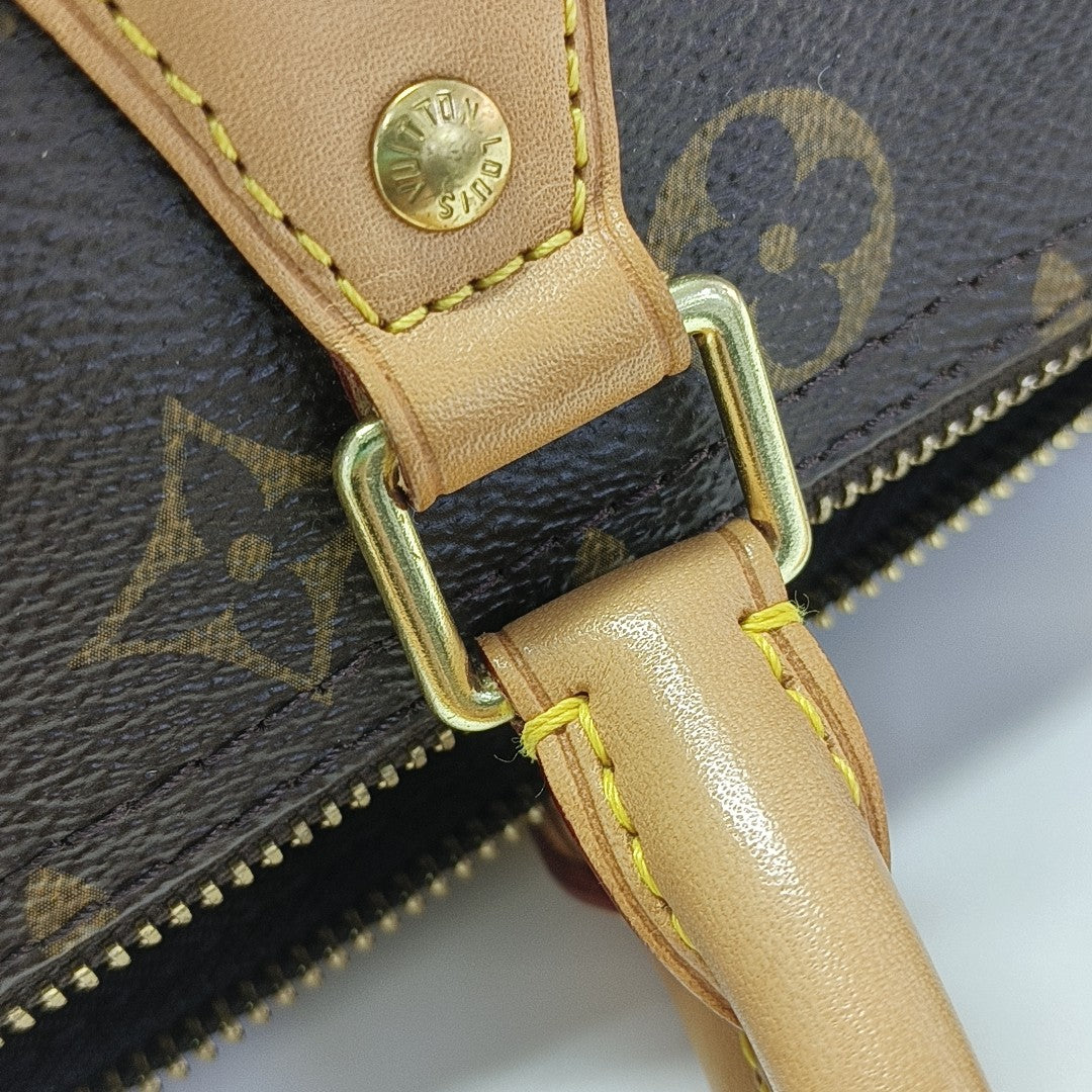 SPEEDY 30 Monogram Coated Canvas Brown