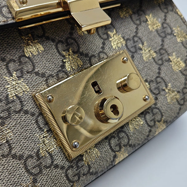 Padlock Small Monogram Coated Canvas Beige
