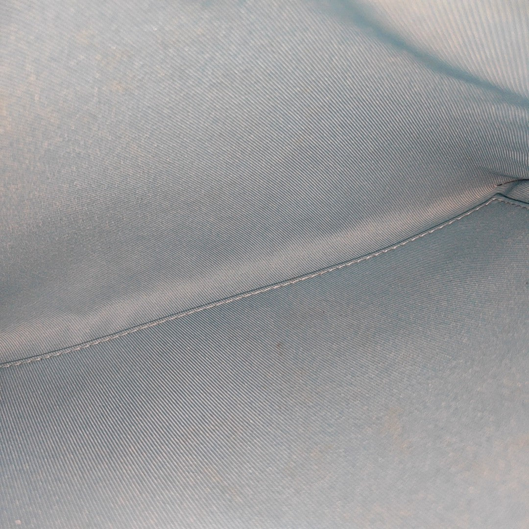 Monogram Calfskin Clutch Blue