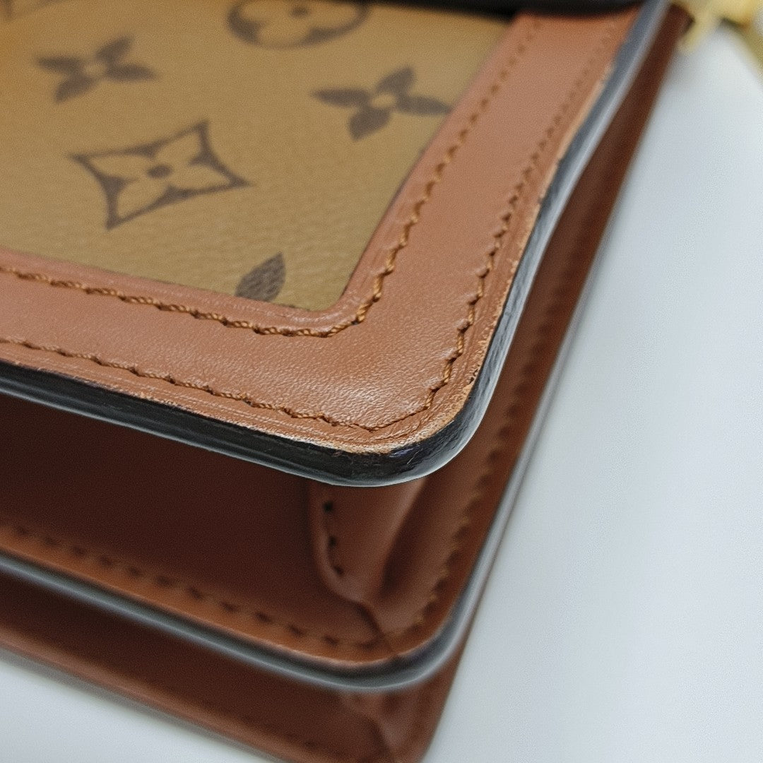 DAUPHINE MM Monogram Coated Canvas Brown