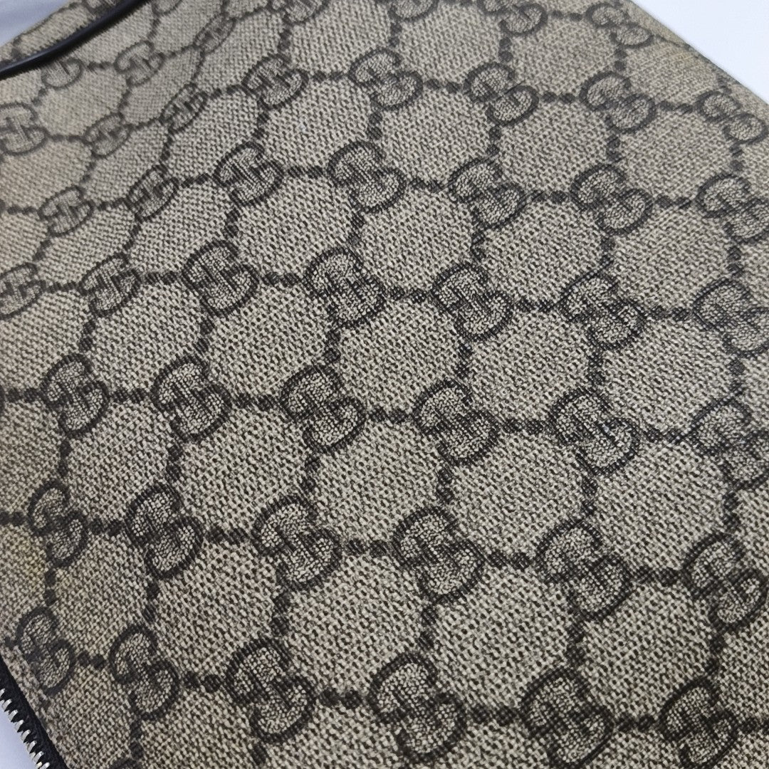 Monogram Coated Canvas Clutch Brown