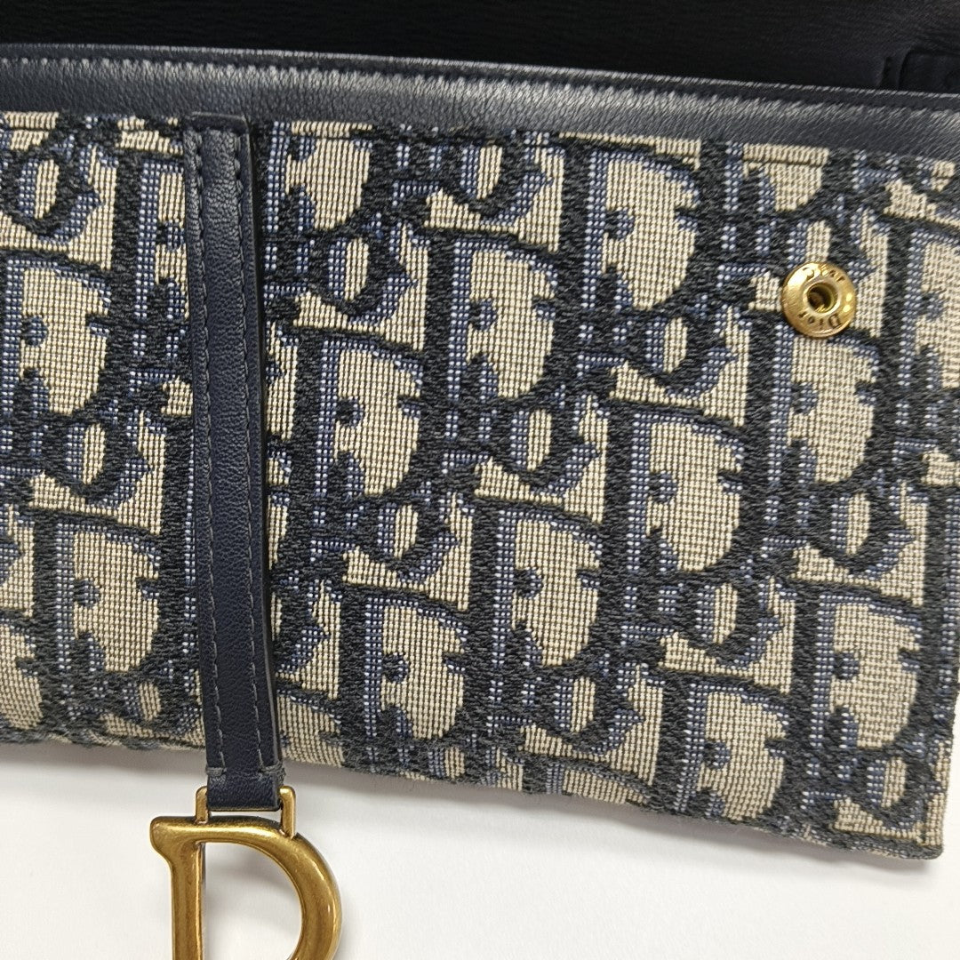 Authenticated pre-owned  Saddle Small Oblique Canvas Blue - Crossbody Bag at Looply