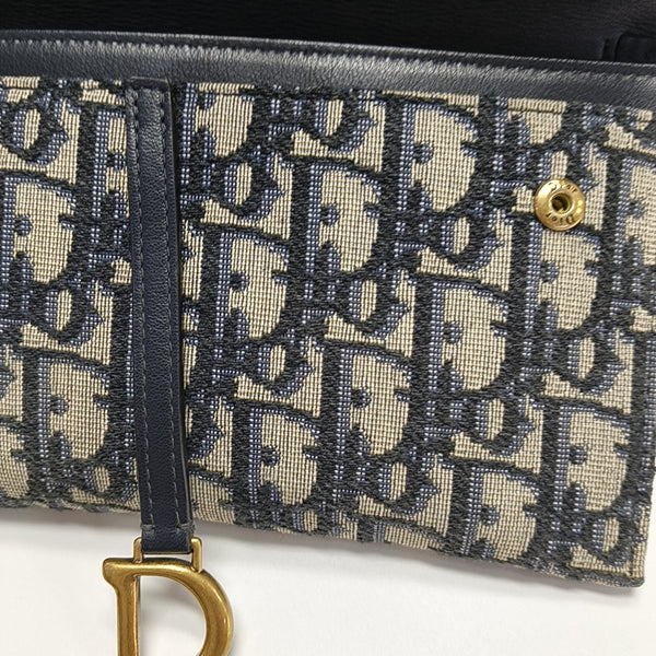 Authenticated pre-owned  Saddle Small Oblique Canvas Blue - Crossbody Bag at Looply
