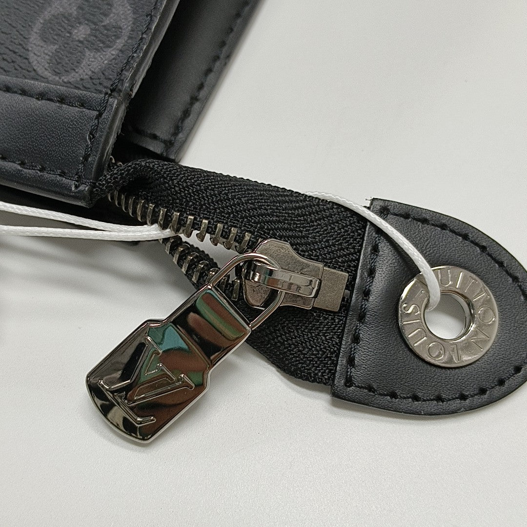 Pochette Voyag MM Monogram Coated Canvas Black