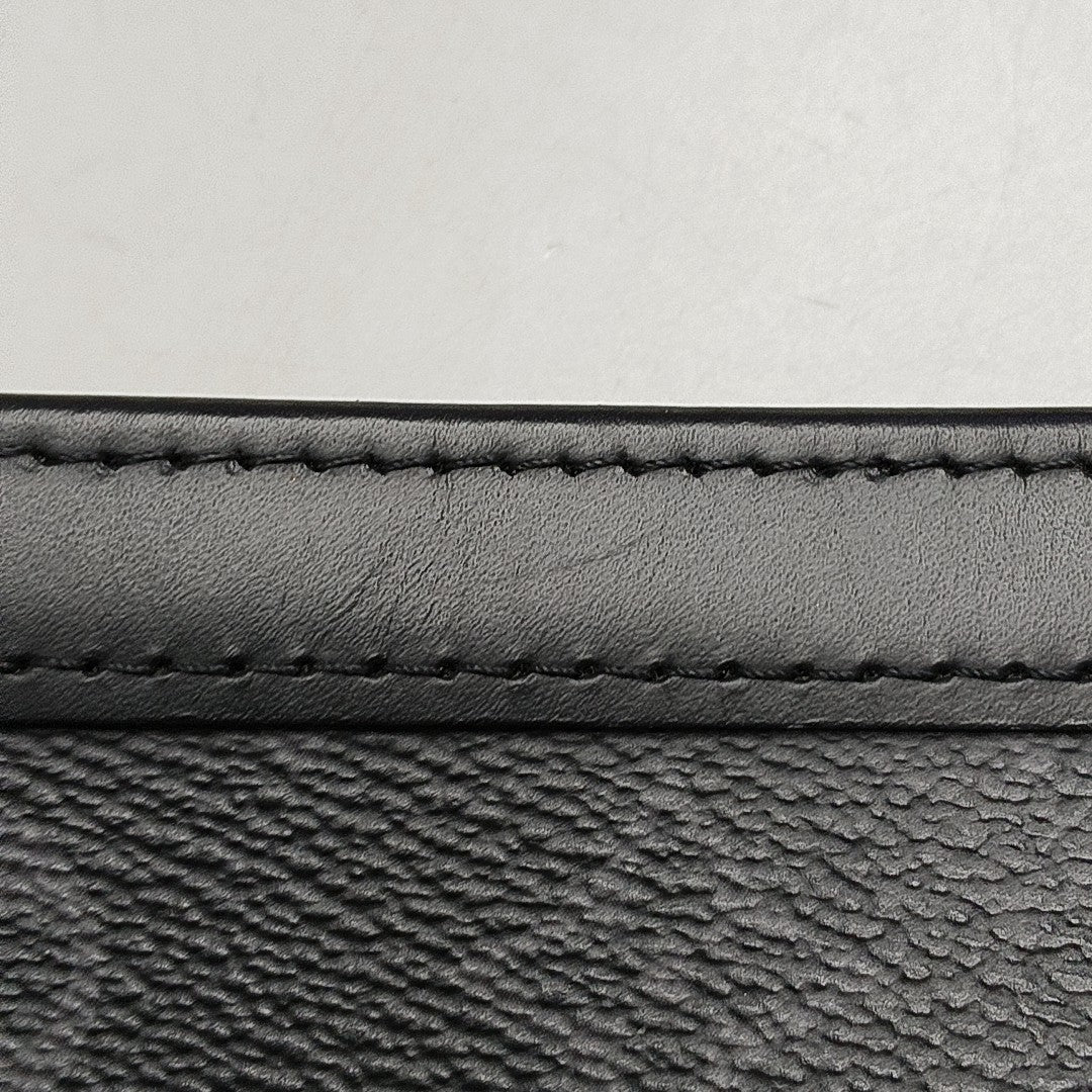 Pochette Voyag MM Monogram Coated Canvas Black