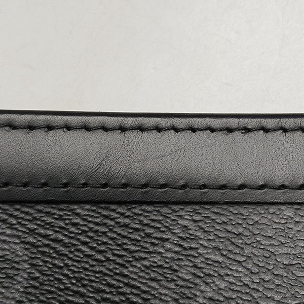 Pochette Voyag MM Monogram Coated Canvas Black