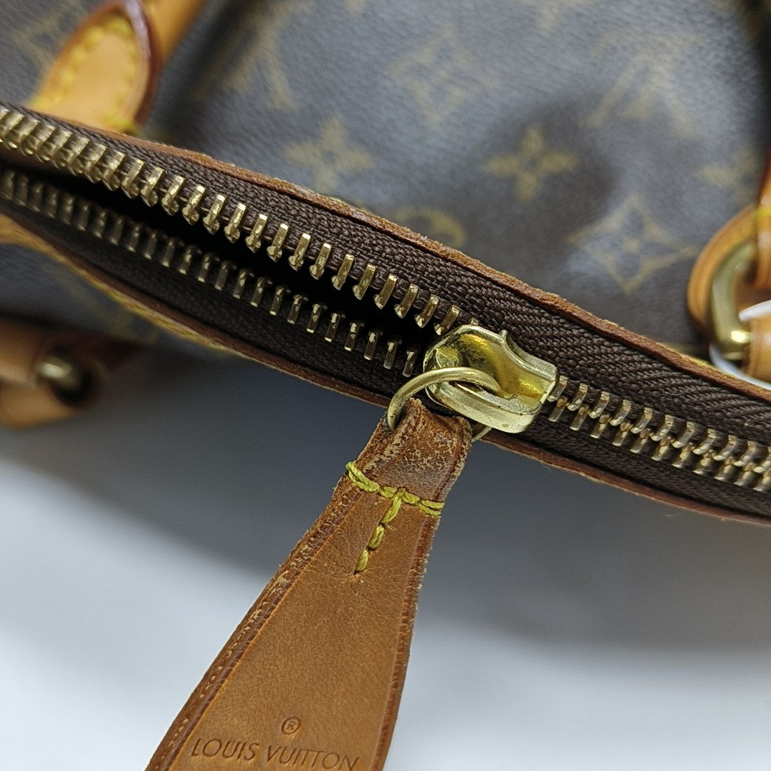 LOCKIT PM Monogram Coated Canvas Brown
