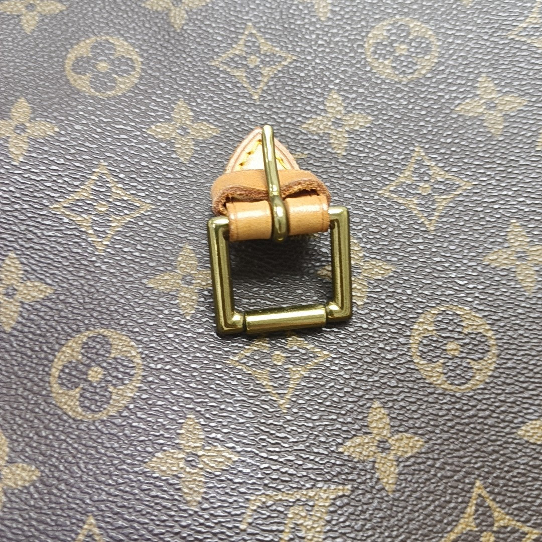 VINTAGE RIVOLI Monogram Coated Canvas Brown