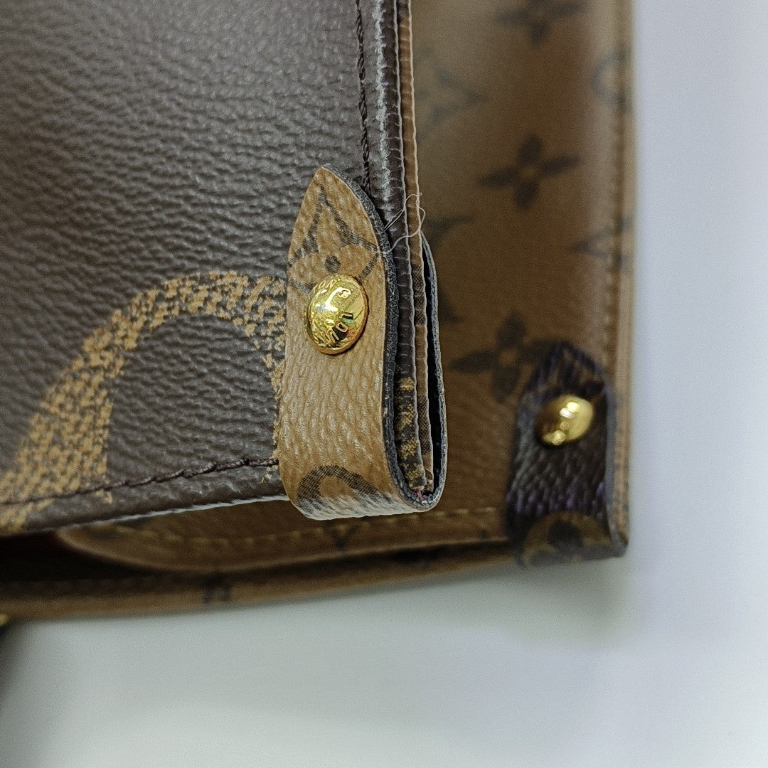 ONTHEGO MM Monogram Coated Canvas Brown
