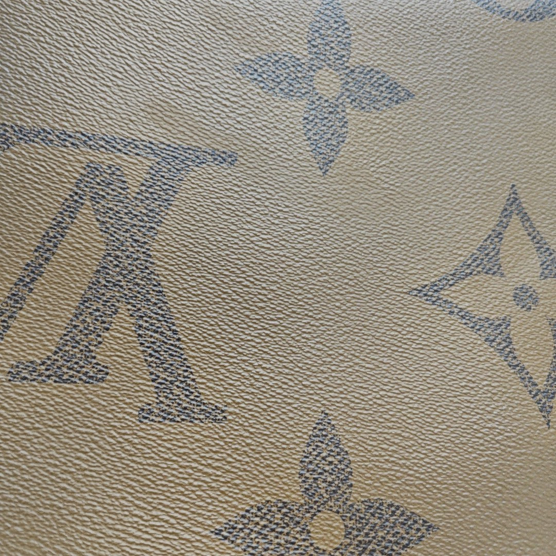 ONTHEGO GM Monogram Coated Canvas Brown