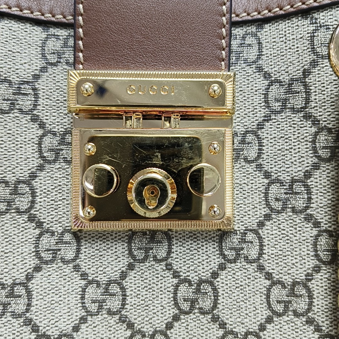 Padlock Small Monogram Coated Canvas Beige