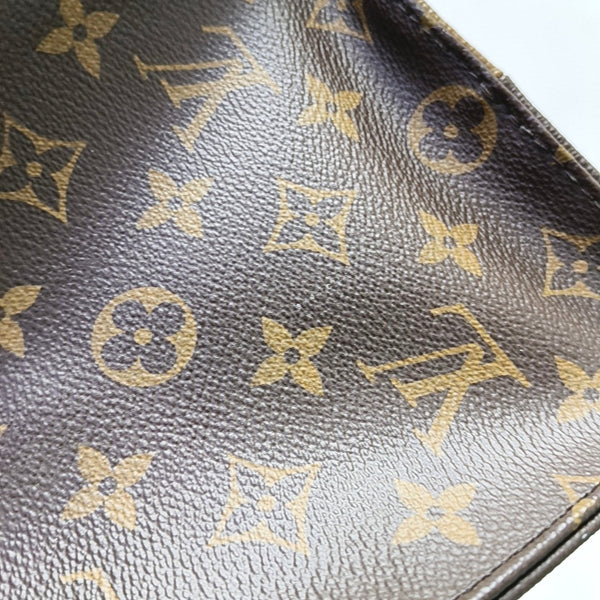 ONTHEGO MM Monogram Coated Canvas Brown