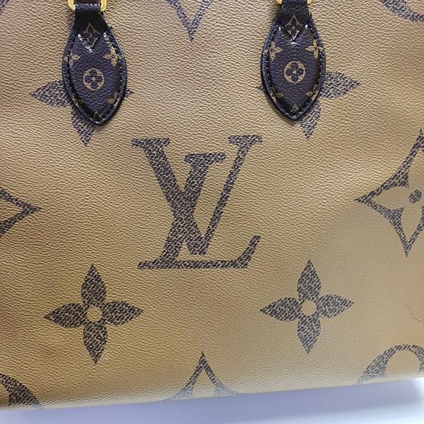 ONTHEGO MM Monogram Coated Canvas Brown