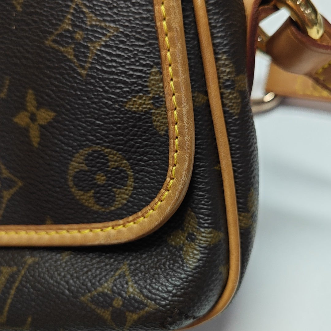 TIKAL Monogram Coated Canvas Brown
