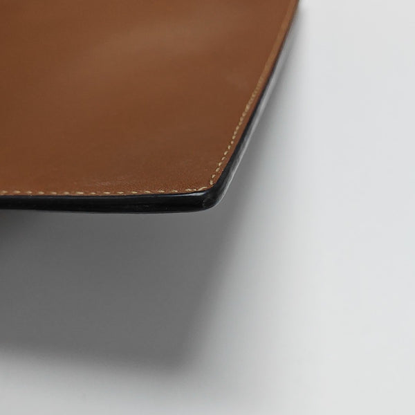 Monogram Coated Canvas Clutch Beige