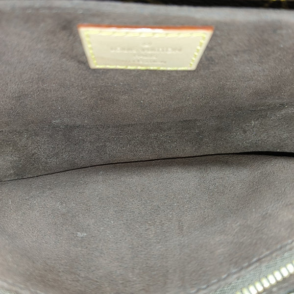 MÉTIS EAST WEST Monogram Coated Canvas Brown