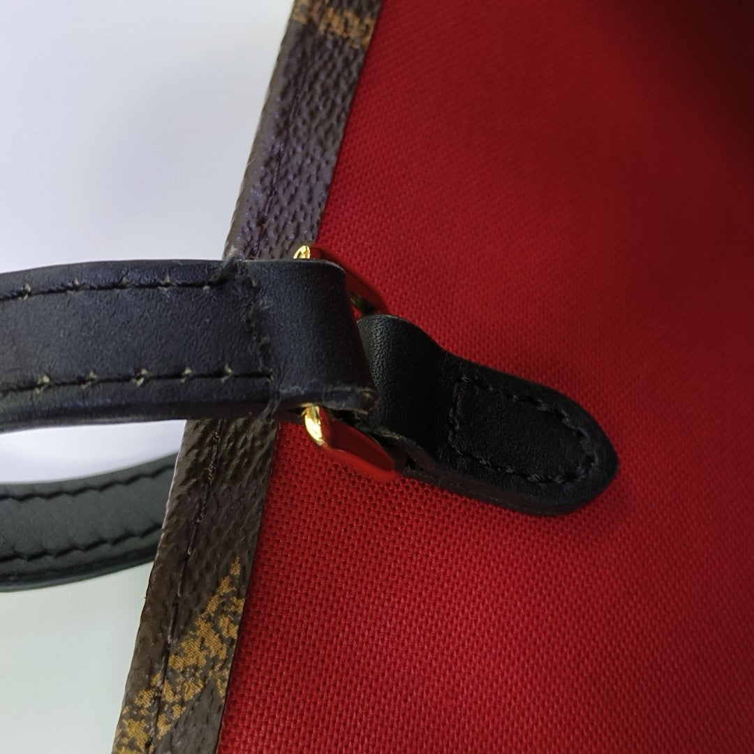 ONTHEGO MM Monogram Coated Canvas Brown