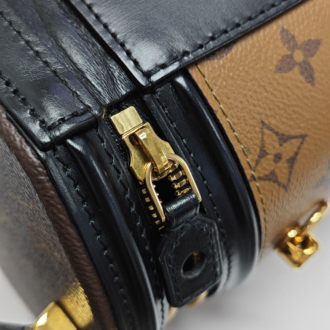 CANNES PM Monogram Coated Canvas Brown