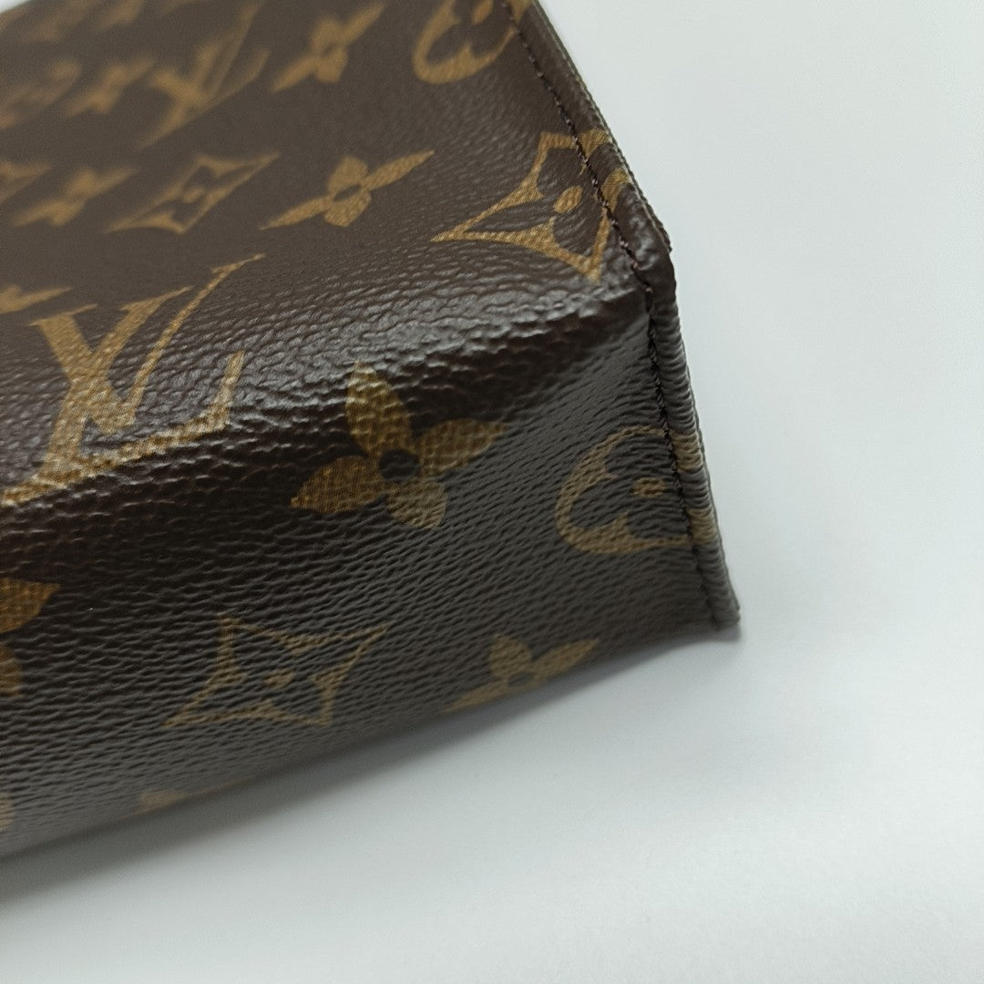 TOILET POCKET 26 Monogram Coated Canvas Brown