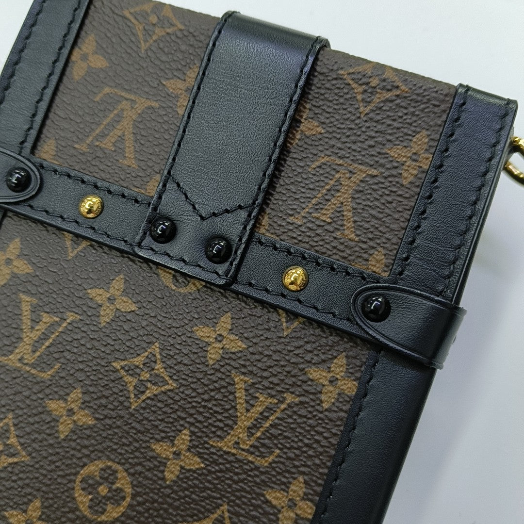 TRUNK Monogram Coated Canvas Brown
