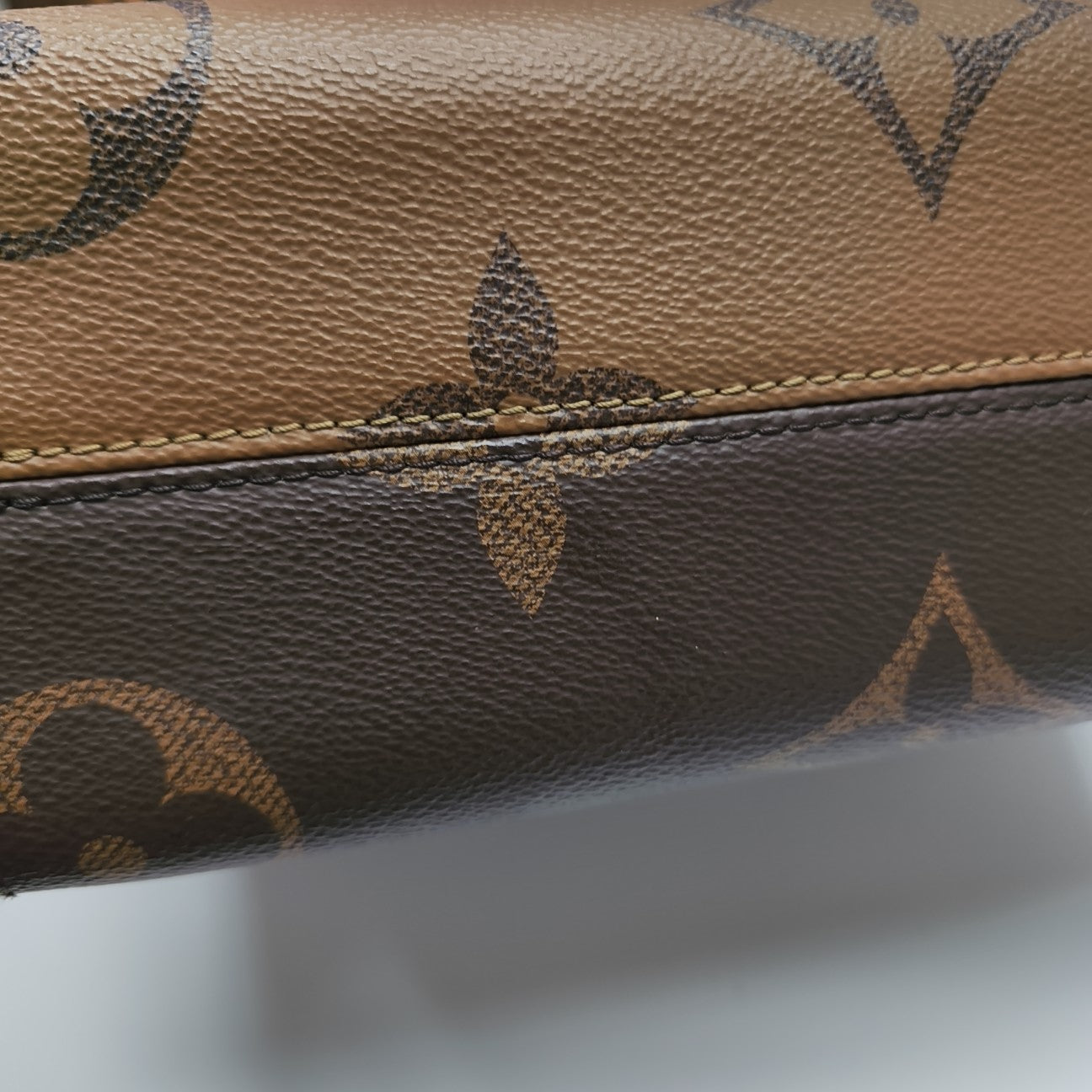 ONTHEGO PM Monogram Coated Canvas Brown
