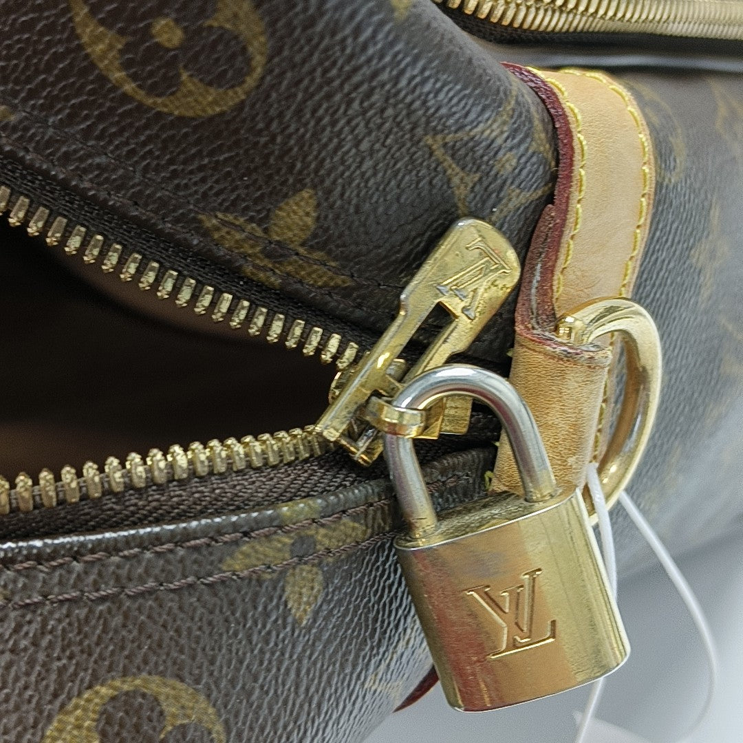 ICARE Monogram Coated Canvas Brown