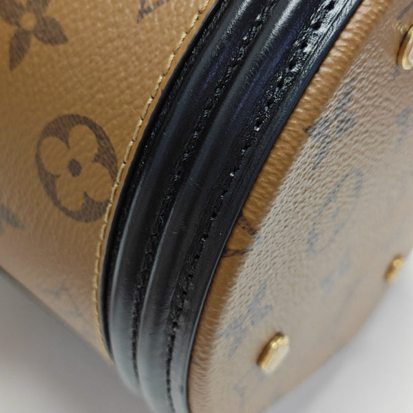 CANNES PM Monogram Coated Canvas Brown