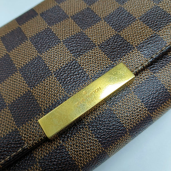 Authenticated pre-owned  FAVORITE Coated Canvas Brown - Crossbody Bag at Looply