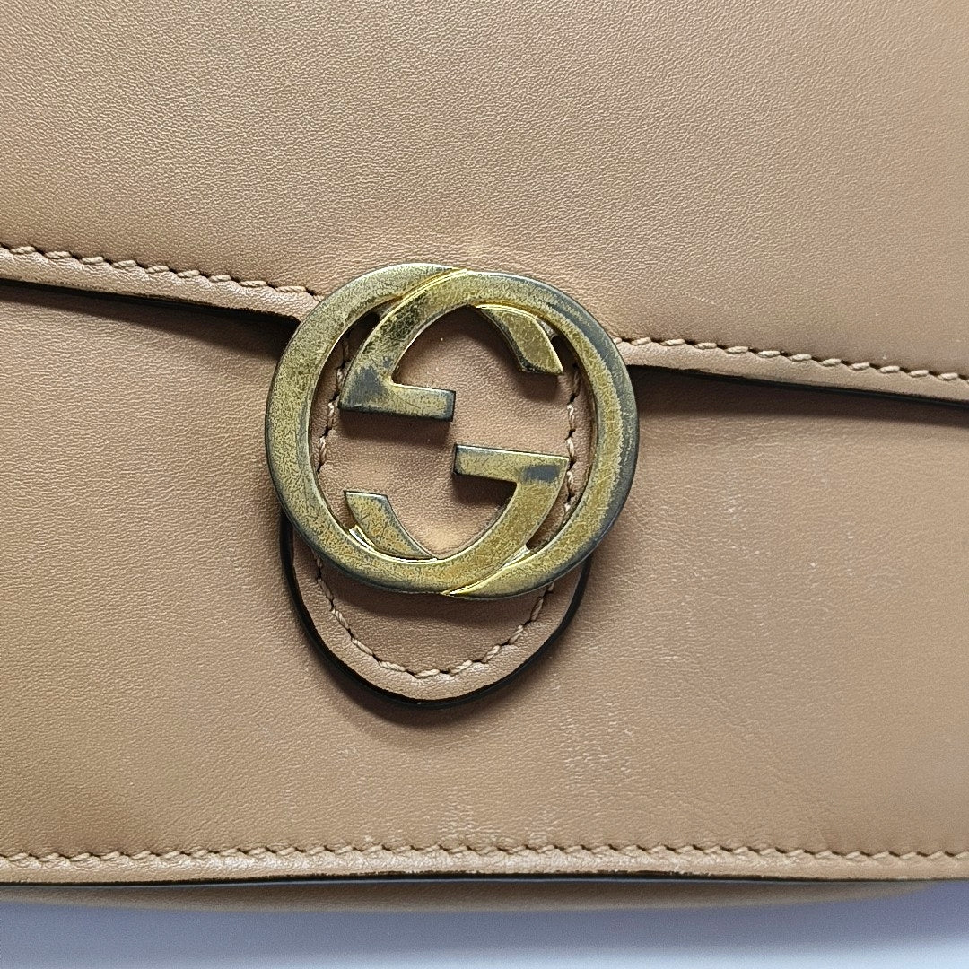 Authenticated pre-owned  Interlocking G Calfskin Beige - Crossbody Bag at Looply