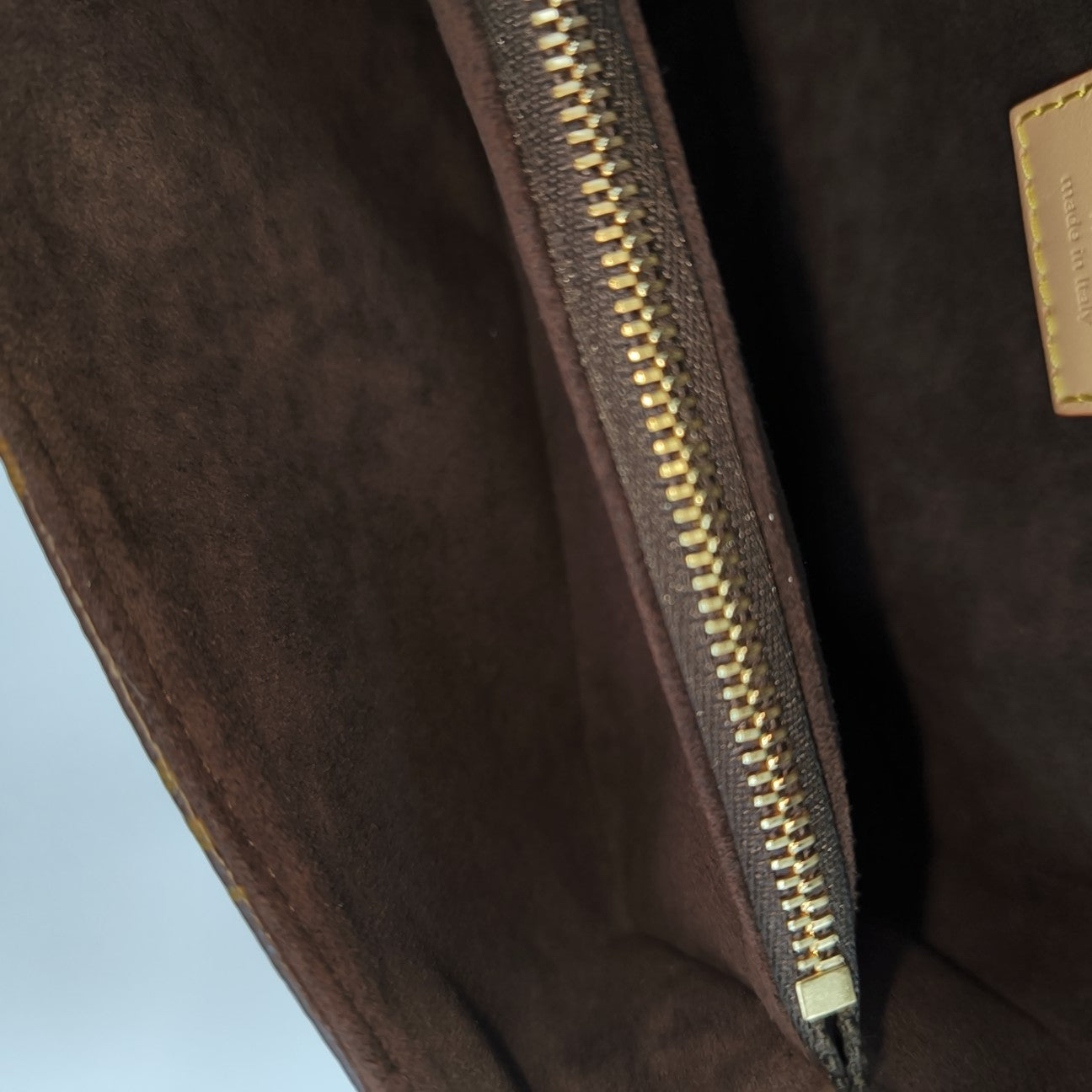 MÉTIS EAST WEST Monogram Coated Canvas Brown