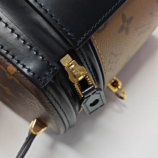 CANNES PM Monogram Coated Canvas Brown