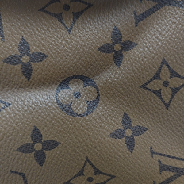 ONTHEGO MM Monogram Coated Canvas Brown