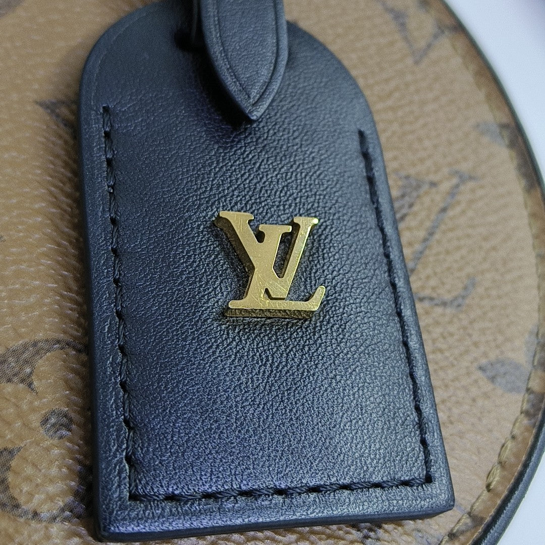 BOITE CHAPEAU Mini Monogram Coated Canvas Brown