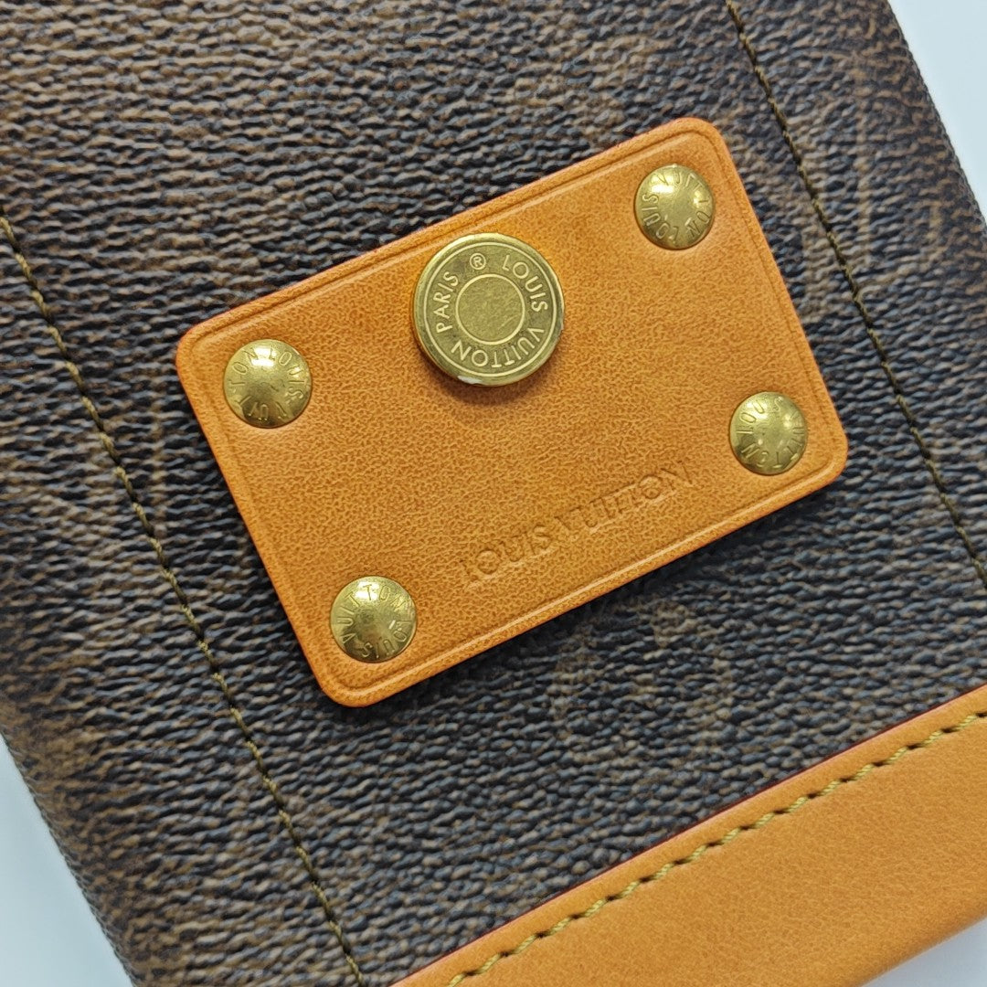 TRUNK Monogram Coated Canvas Brown