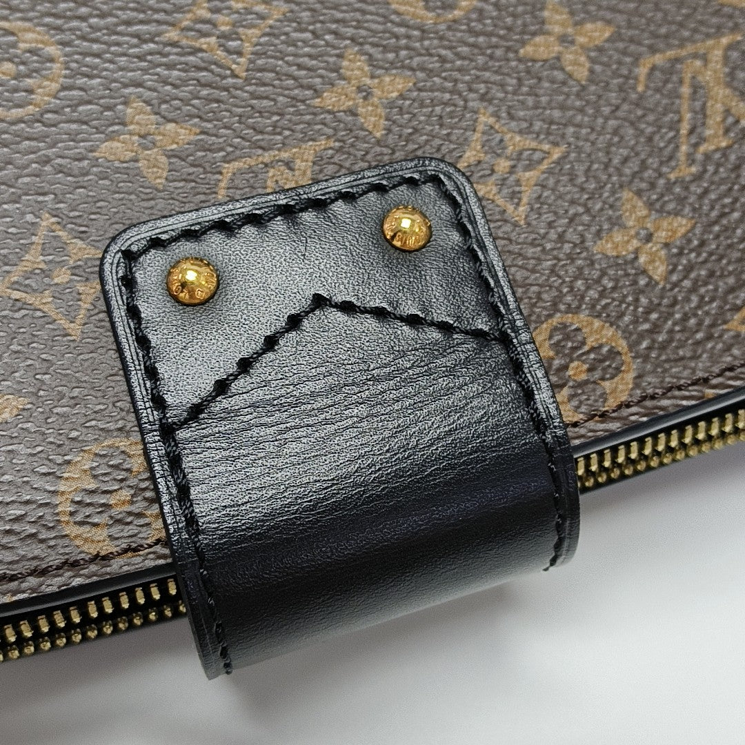 TRUNK Monogram Coated Canvas Brown