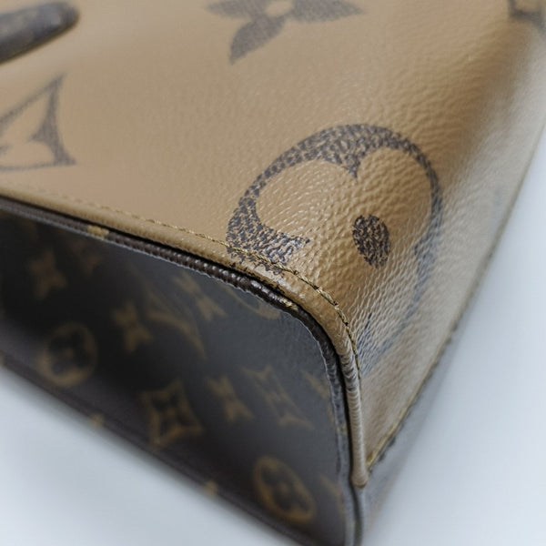 ONTHEGO PM Monogram Coated Canvas Brown