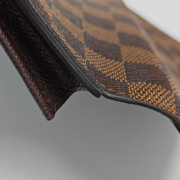 Damier Ebene Coated Canvas Clutch Brown