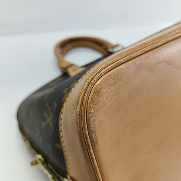 ALMA PM Monogram Coated Canvas Brown