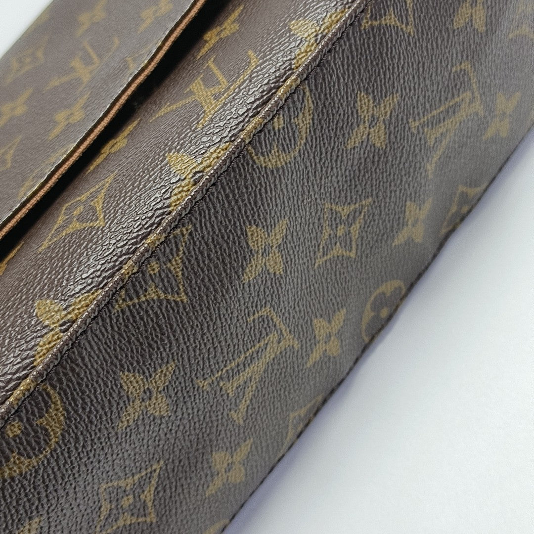 LOOPING PM Monogram Coated Canvas Brown