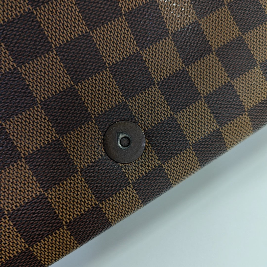 TRIBECA Damier Ebene Coated Canvas Brown