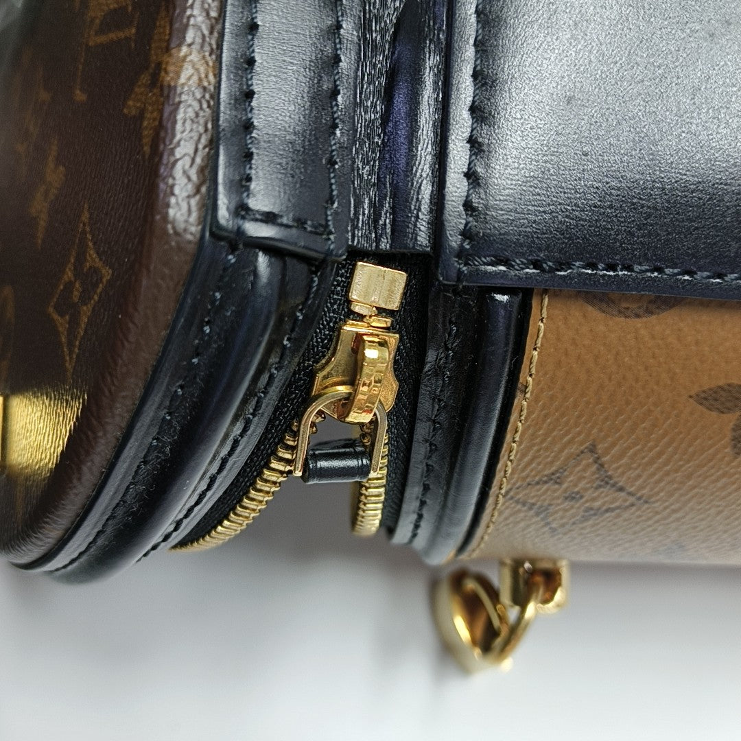 CANNES PM Monogram Coated Canvas Brown