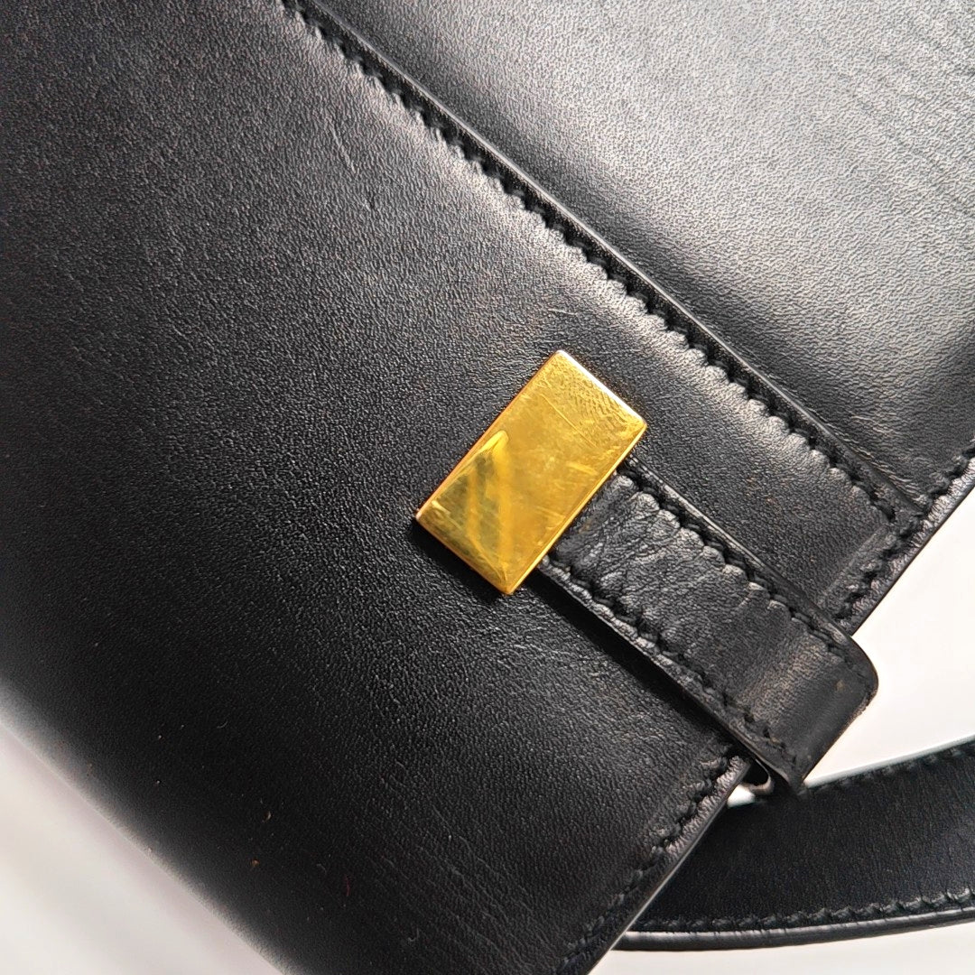 Authenticated pre-owned  MANHATTAN Calfskin Black - Top Handle Bag at Looply