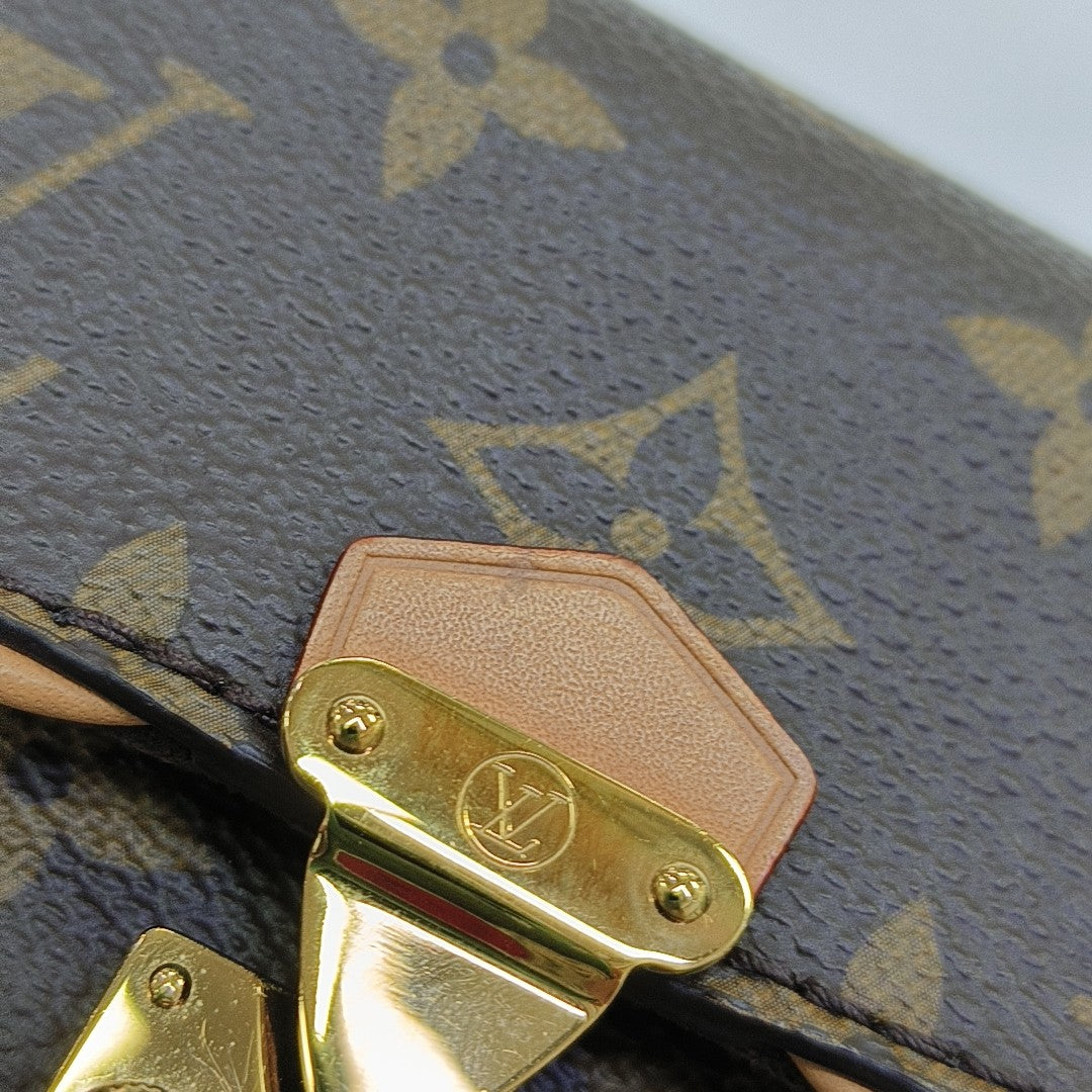 Pochette Camille Monogram Coated Canvas Brown