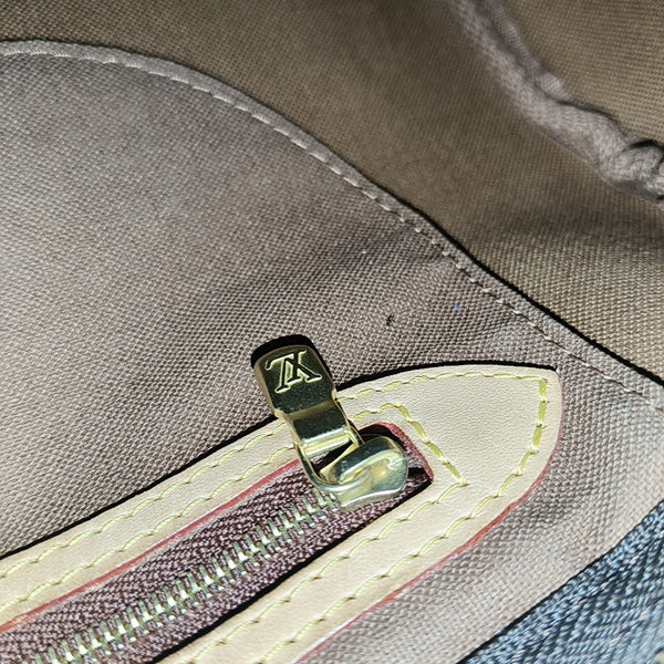 SPEEDY 25 Monogram Coated Canvas Brown